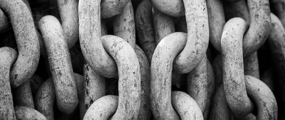 Strong interconnected metal chain symbolizing strength and security