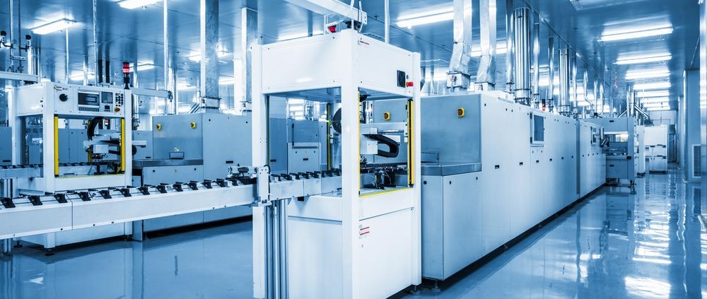 Modern automated manufacturing facility with advanced production equipment and conveyor systems